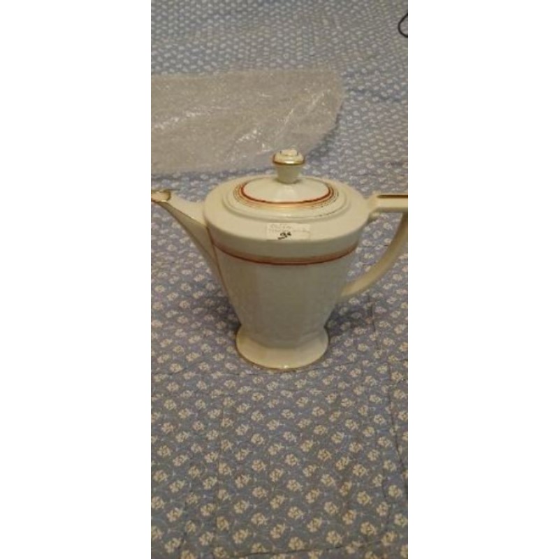 Cafetière ou théière ancienne en porcelaine 