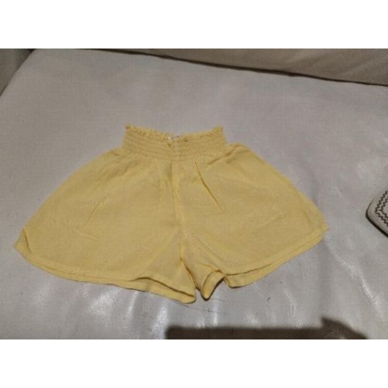 short monoprix jaune 6 ans fluide et taille smockée
