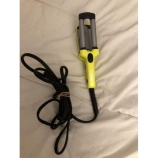 Fer à boucler les cheveux...