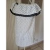 Robe blanche à points noirs 