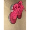 Baskets femme rose virgule blanche Nike 