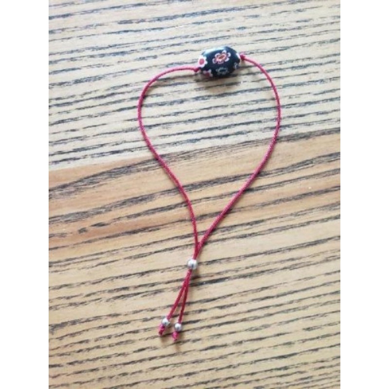 Bracelet cordon rouge perle verre millefiori 