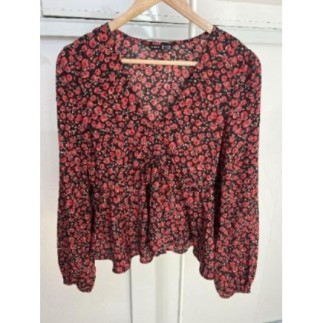 Blouse noir avec fleurs...