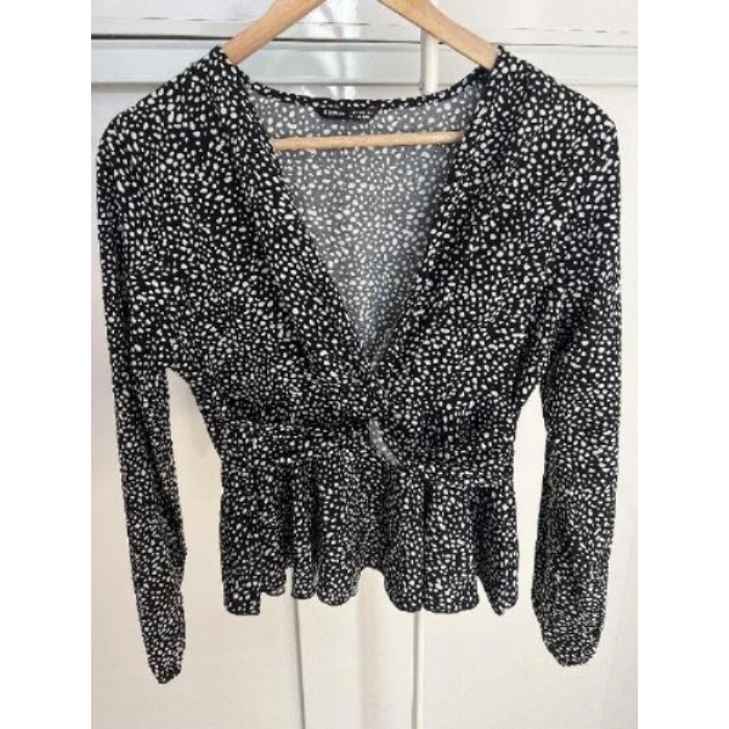 Blouse noir à taches blanches taille M