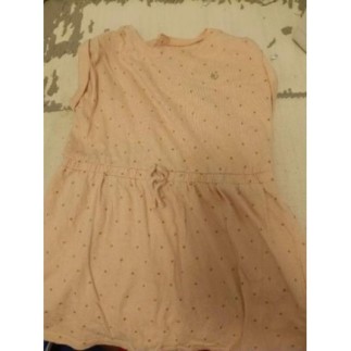 Robe orange à points dorés...