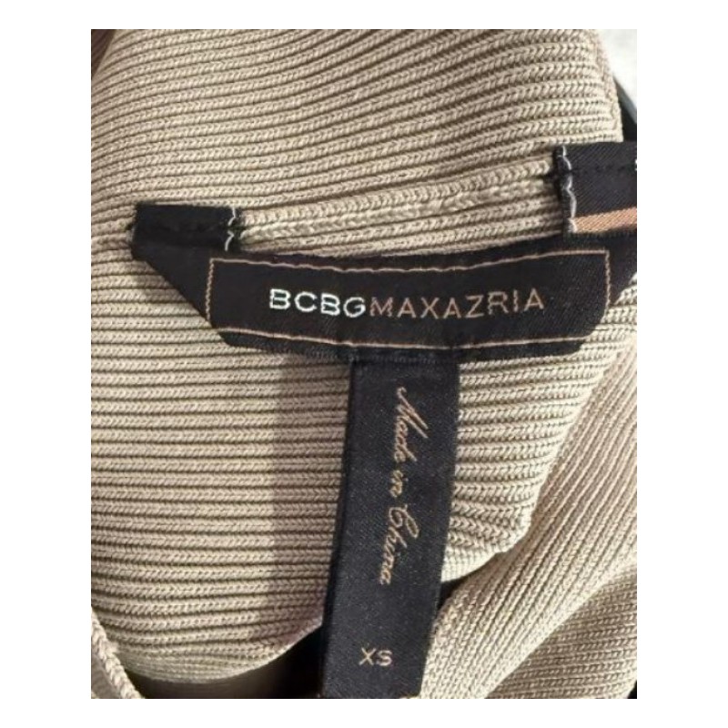 Jupe courte beige marque BCBGMAXAZRIA taille xs très bon état 