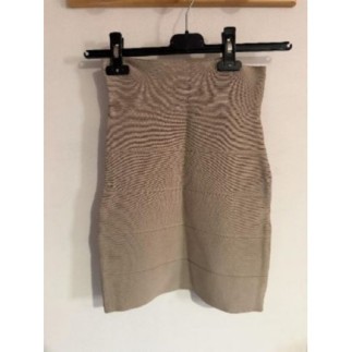Jupe courte beige marque BCBGMAXAZRIA taille xs très bon état 