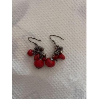 Boucles d’oreilles, chute,...