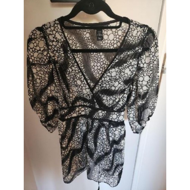 Blouse H&M taille 34 mais équivaut un 38