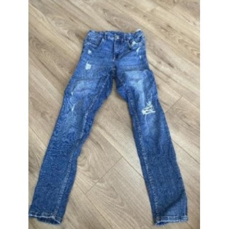 Jean bleu slim à  trous...