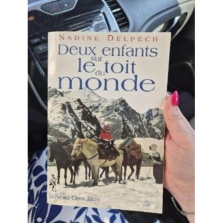 Livre 2 enfants sur le toit...