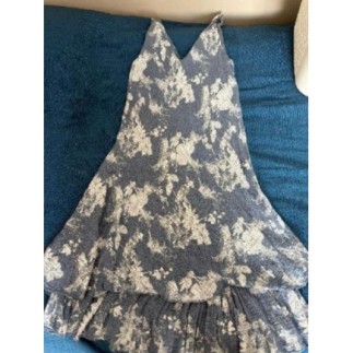 Robe bleue motifs blancs...