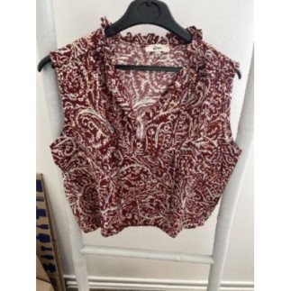 Blouse sans manches fleuri...