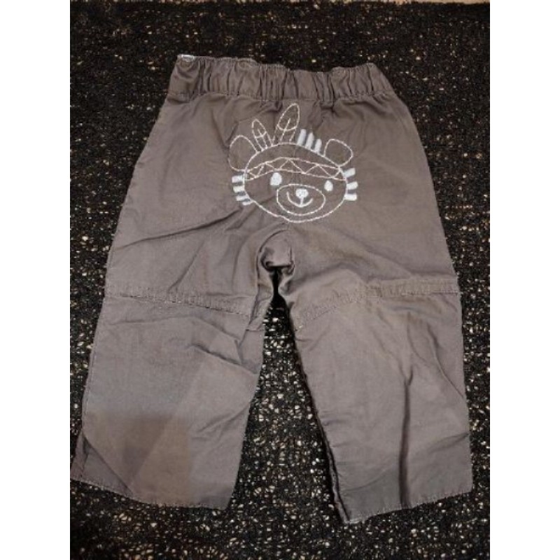 Pantalon à ouverture par l'entre jambe 0 mois marque "petit kimbaloo"