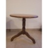 Table ronde marron en bois massif 