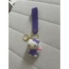 Porte-clés Hello Kitty violet , tenant une boisson