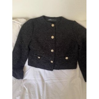 Tres jolie veste noire...