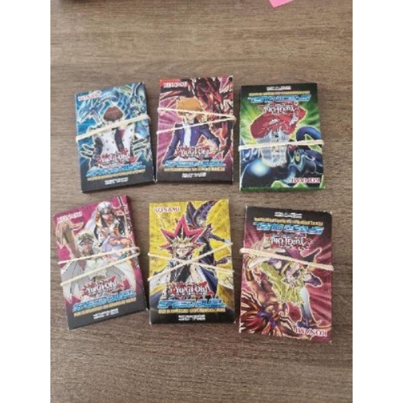 Cartes  YU GI OH 23 cartes par paquet 