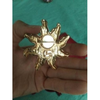 Broche soleil doré Shalala...