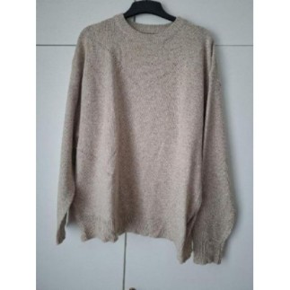 Pull beige neuf avec motifs...