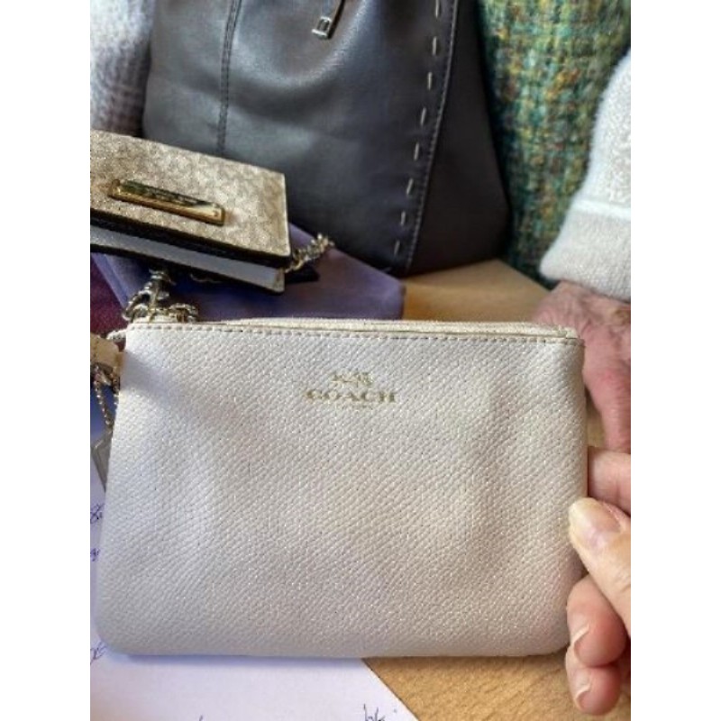 Pochette Coach