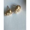 boucle d'oreille clou tete de mort doré alliage de zinc