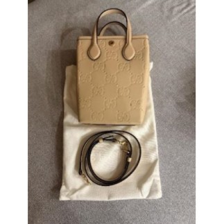 Sac en bandoulière Gucci...