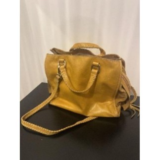 Sac à main couleur moutarde 