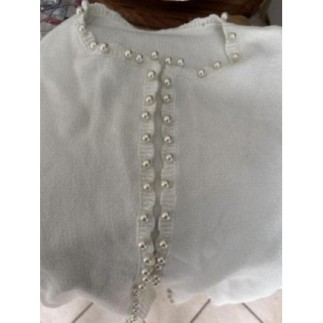 Gilet blanc avec perle...