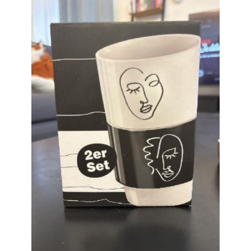 2 tasses visage noir et blanche