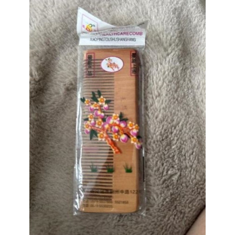 Peigne en bois cheveux neuf 