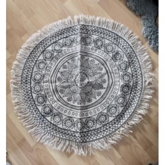 Tapis rond beige à motif noir